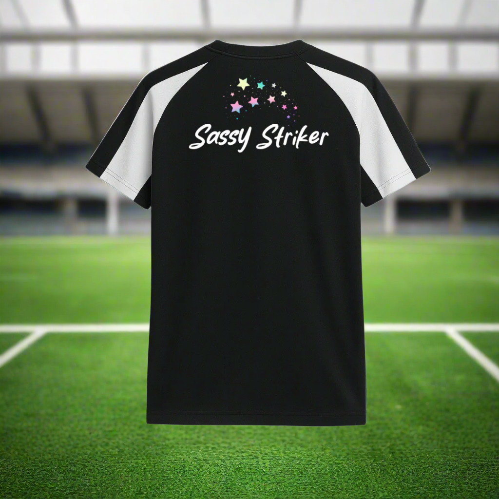 black and white football kit for young girls with empowering slogan