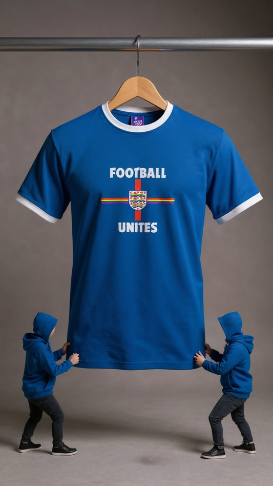 Blue Pride t-shirt with 'Football Unites' text on a hanger, held by two people against a gray background