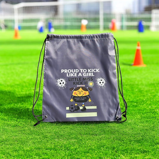 Drawstring bag with motivational text and graphics on a grass field